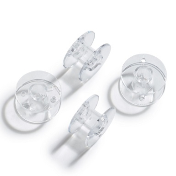 Sewing machine bobbins for horizontal looper