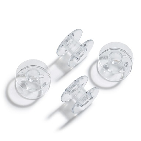 Sewing machine bobbins for CB- looper